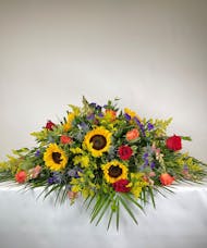 Rainbow of Remembrance Casket Spray